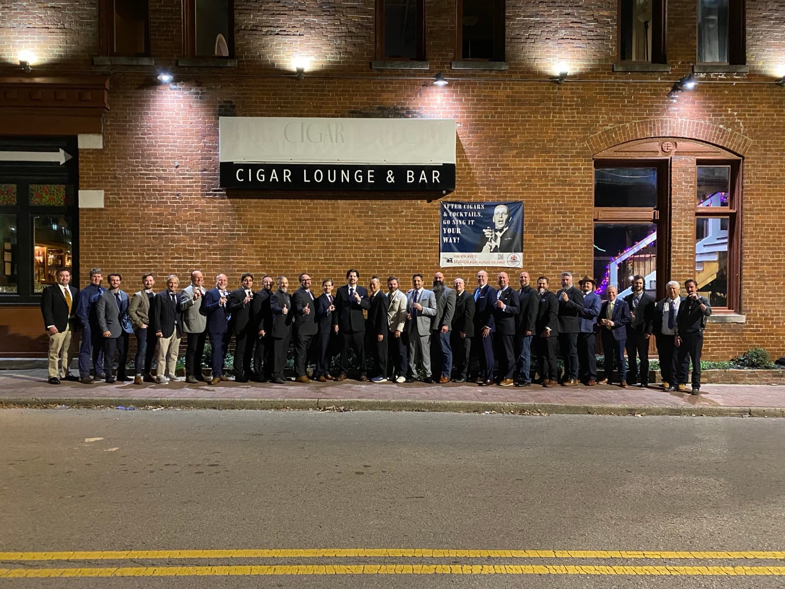A large group of RMH members outside the venue at the 2022 conference.